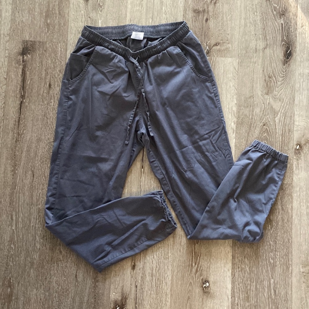 Grey jogger style scrub pants